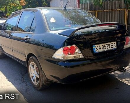 Черный Мицубиси Лансер, объемом двигателя 1.6 л и пробегом 238 тыс. км за 4300 $, фото 2 на Automoto.ua