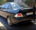 Черный Мицубиси Лансер, объемом двигателя 1.6 л и пробегом 238 тыс. км за 4300 $, фото 2 на Automoto.ua