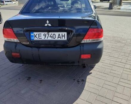 Черный Мицубиси Лансер, объемом двигателя 1.58 л и пробегом 128 тыс. км за 4600 $, фото 26 на Automoto.ua