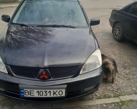 Черный Мицубиси Лансер, объемом двигателя 1.6 л и пробегом 260 тыс. км за 3800 $, фото 9 на Automoto.ua