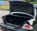 Черный Мицубиси Лансер, объемом двигателя 2 л и пробегом 170 тыс. км за 5500 $, фото 6 на Automoto.ua
