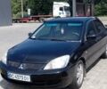 Чорний Міцубісі Lancer, об'ємом двигуна 1.6 л та пробігом 200 тис. км за 4500 $, фото 1 на Automoto.ua