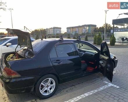 Черный Мицубиси Лансер, объемом двигателя 1.6 л и пробегом 257 тыс. км за 4500 $, фото 8 на Automoto.ua