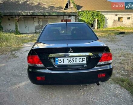 Мицубиси Лансер 2006 в Киеве на Automoto.ua Черный Мицубиси Лансер, объемом двигателя 1.58 л и пробегом 268 тыс. км за 3400 $, фото 15 на Automoto.ua