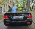 Черный Мицубиси Лансер, объемом двигателя 1.6 л и пробегом 200 тыс. км за 4399 $, фото 1 на Automoto.ua