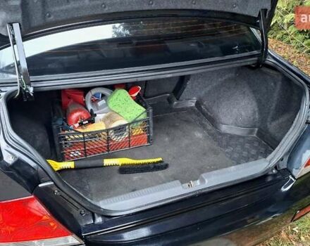 Черный Мицубиси Лансер, объемом двигателя 1.58 л и пробегом 246 тыс. км за 4200 $, фото 6 на Automoto.ua