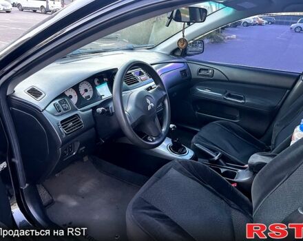 Чорний Міцубісі Lancer, об'ємом двигуна 1.6 л та пробігом 329 тис. км за 3500 $, фото 5 на Automoto.ua