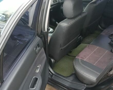 Черный Мицубиси Лансер, объемом двигателя 1.6 л и пробегом 230 тыс. км за 3250 $, фото 4 на Automoto.ua