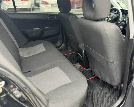 Черный Мицубиси Лансер, объемом двигателя 1.58 л и пробегом 370 тыс. км за 3500 $, фото 9 на Automoto.ua