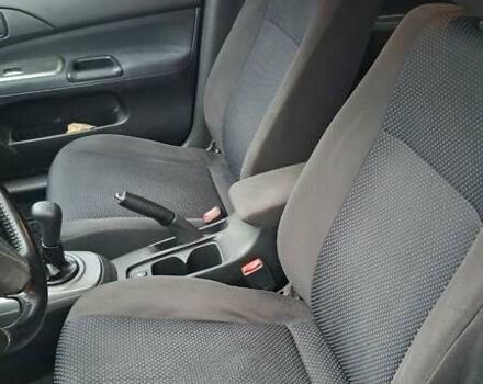 Черный Мицубиси Лансер, объемом двигателя 1.58 л и пробегом 246 тыс. км за 4200 $, фото 12 на Automoto.ua