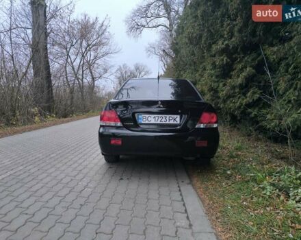 Черный Мицубиси Лансер, объемом двигателя 1.58 л и пробегом 246 тыс. км за 4200 $, фото 16 на Automoto.ua