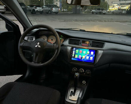 Чорний Міцубісі Lancer, об'ємом двигуна 1.58 л та пробігом 230 тис. км за 4350 $, фото 19 на Automoto.ua