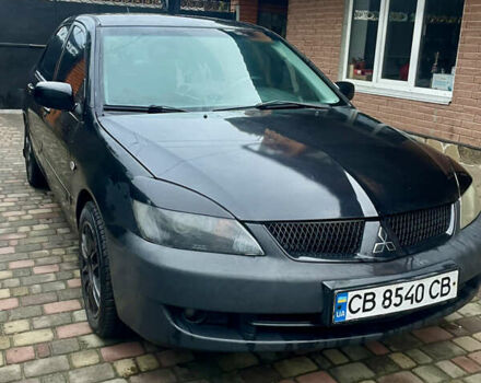 Чорний Міцубісі Lancer, об'ємом двигуна 1.59 л та пробігом 305 тис. км за 2950 $, фото 4 на Automoto.ua