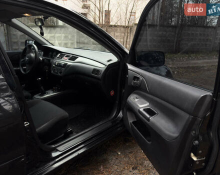 Чорний Міцубісі Lancer, об'ємом двигуна 1.58 л та пробігом 210 тис. км за 3900 $, фото 14 на Automoto.ua
