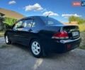 Мицубиси Лансер 2006 в Киеве на Automoto.ua Черный Мицубиси Лансер, объемом двигателя 1.58 л и пробегом 268 тыс. км за 3400 $, фото 3 на Automoto.ua