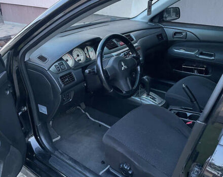 Чорний Міцубісі Lancer, об'ємом двигуна 1.6 л та пробігом 170 тис. км за 4900 $, фото 6 на Automoto.ua