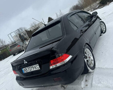 Чорний Міцубісі Lancer, об'ємом двигуна 1.58 л та пробігом 340 тис. км за 3550 $, фото 11 на Automoto.ua