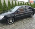 Черный Мицубиси Лансер, объемом двигателя 1.6 л и пробегом 98 тыс. км за 5500 $, фото 9 на Automoto.ua