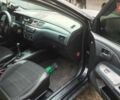 Чорний Міцубісі Lancer, об'ємом двигуна 1.58 л та пробігом 180 тис. км за 5000 $, фото 2 на Automoto.ua
