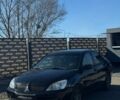 Чорний Міцубісі Lancer, об'ємом двигуна 1.58 л та пробігом 441 тис. км за 3800 $, фото 1 на Automoto.ua