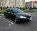 Чорний Міцубісі Lancer, об'ємом двигуна 1.58 л та пробігом 329 тис. км за 3500 $, фото 1 на Automoto.ua