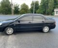 Черный Мицубиси Лансер, объемом двигателя 1.6 л и пробегом 270 тыс. км за 3953 $, фото 3 на Automoto.ua