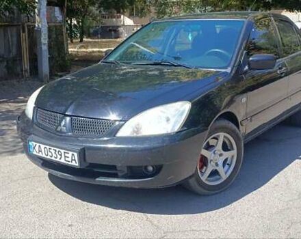 Чорний Міцубісі Lancer, об'ємом двигуна 1.6 л та пробігом 240 тис. км за 3900 $, фото 1 на Automoto.ua