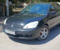 Чорний Міцубісі Lancer, об'ємом двигуна 1.6 л та пробігом 240 тис. км за 3900 $, фото 1 на Automoto.ua