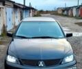 Чорний Міцубісі Lancer, об'ємом двигуна 1.6 л та пробігом 240 тис. км за 4000 $, фото 6 на Automoto.ua