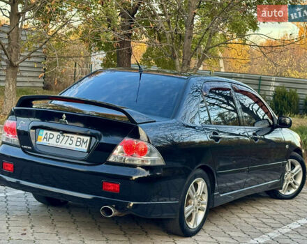 Міцубісі Lancer 2006 у Дніпро (Дніпропетровську) на Automoto.ua Чорний Міцубісі Lancer, об'ємом двигуна 2 л та пробігом 230 тис. км за 4900 $, фото 11 на Automoto.ua