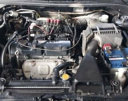 Чорний Міцубісі Lancer, об'ємом двигуна 1.59 л та пробігом 185 тис. км за 4900 $, фото 12 на Automoto.ua