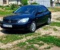 Чорний Міцубісі Lancer, об'ємом двигуна 1.6 л та пробігом 280 тис. км за 2500 $, фото 1 на Automoto.ua