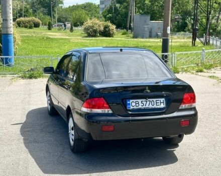 Чорний Міцубісі Lancer, об'ємом двигуна 0.16 л та пробігом 196 тис. км за 4400 $, фото 7 на Automoto.ua