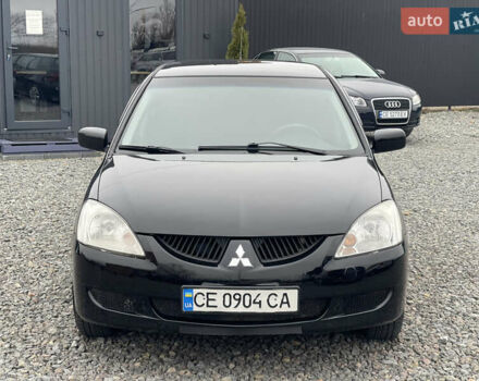 Чорний Міцубісі Lancer, об'ємом двигуна 1.58 л та пробігом 230 тис. км за 3350 $, фото 2 на Automoto.ua