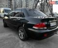 Чорний Міцубісі Lancer, об'ємом двигуна 1.58 л та пробігом 329 тис. км за 3500 $, фото 4 на Automoto.ua