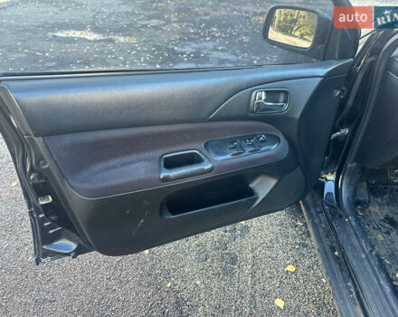 Чорний Міцубісі Lancer, об'ємом двигуна 2 л та пробігом 270 тис. км за 3300 $, фото 6 на Automoto.ua