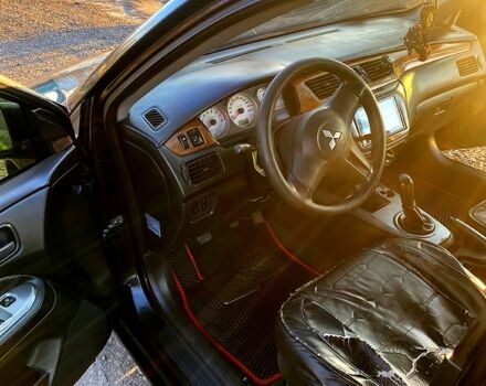 Чорний Міцубісі Lancer, об'ємом двигуна 1.6 л та пробігом 330 тис. км за 4500 $, фото 2 на Automoto.ua