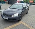 Черный Мицубиси Лансер, объемом двигателя 1.6 л и пробегом 361 тыс. км за 2000 $, фото 1 на Automoto.ua