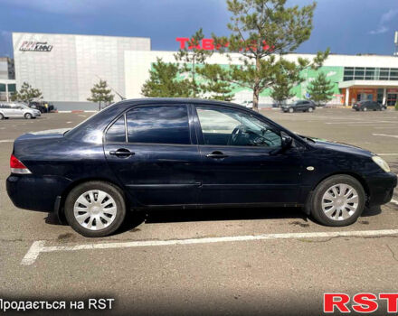 Мицубиси Лансер 2006 в Николаеве на Automoto.ua Черный Мицубиси Лансер, объемом двигателя 1.6 л и пробегом 260 тыс. км за 4999 $, фото 6 на Automoto.ua