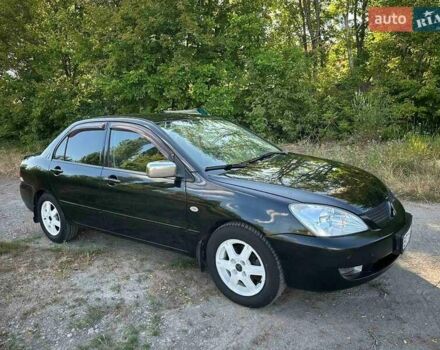 Мицубиси Лансер 2006 в Киеве на Automoto.ua Черный Мицубиси Лансер, объемом двигателя 1.58 л и пробегом 268 тыс. км за 3400 $, фото 9 на Automoto.ua