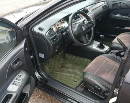 Чорний Міцубісі Lancer, об'ємом двигуна 1.6 л та пробігом 230 тис. км за 3250 $, фото 3 на Automoto.ua