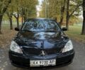 Черный Мицубиси Лансер, объемом двигателя 1.6 л и пробегом 232 тыс. км за 3404 $, фото 1 на Automoto.ua