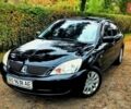 Чорний Міцубісі Lancer, об'ємом двигуна 1.6 л та пробігом 179 тис. км за 4600 $, фото 1 на Automoto.ua