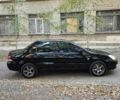 Черный Мицубиси Лансер, объемом двигателя 1.6 л и пробегом 200 тыс. км за 4399 $, фото 3 на Automoto.ua