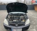 Чорний Міцубісі Lancer, об'ємом двигуна 1.58 л та пробігом 282 тис. км за 4100 $, фото 4 на Automoto.ua