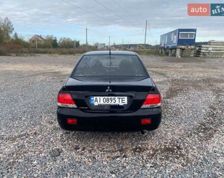 Чорний Міцубісі Lancer, об'ємом двигуна 1.6 л та пробігом 335 тис. км за 3500 $, фото 3 на Automoto.ua
