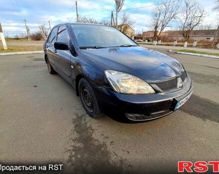 Чорний Міцубісі Lancer, об'ємом двигуна 1.6 л та пробігом 297 тис. км за 2100 $, фото 8 на Automoto.ua