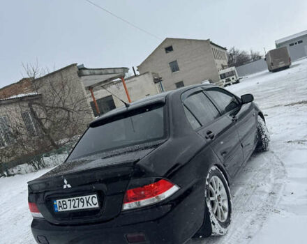 Чорний Міцубісі Lancer, об'ємом двигуна 1.58 л та пробігом 340 тис. км за 3550 $, фото 22 на Automoto.ua