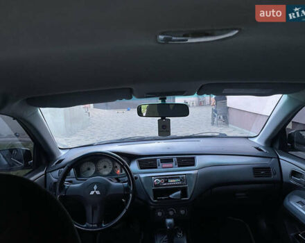 Чорний Міцубісі Lancer, об'ємом двигуна 1.6 л та пробігом 170 тис. км за 4900 $, фото 8 на Automoto.ua