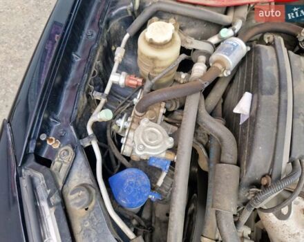 Черный Мицубиси Лансер, объемом двигателя 2 л и пробегом 168 тыс. км за 4999 $, фото 4 на Automoto.ua